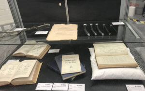 Display case with old medical texts and equipment