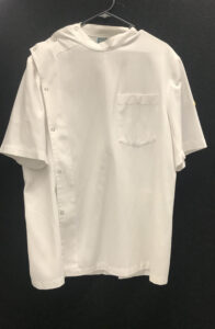 Hanging white student nurse shirt
