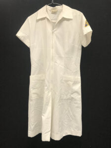 Hanging white student nurse uniform