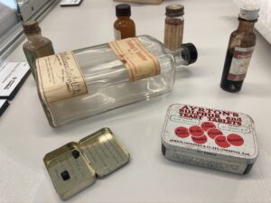 display of antiques medicine containers